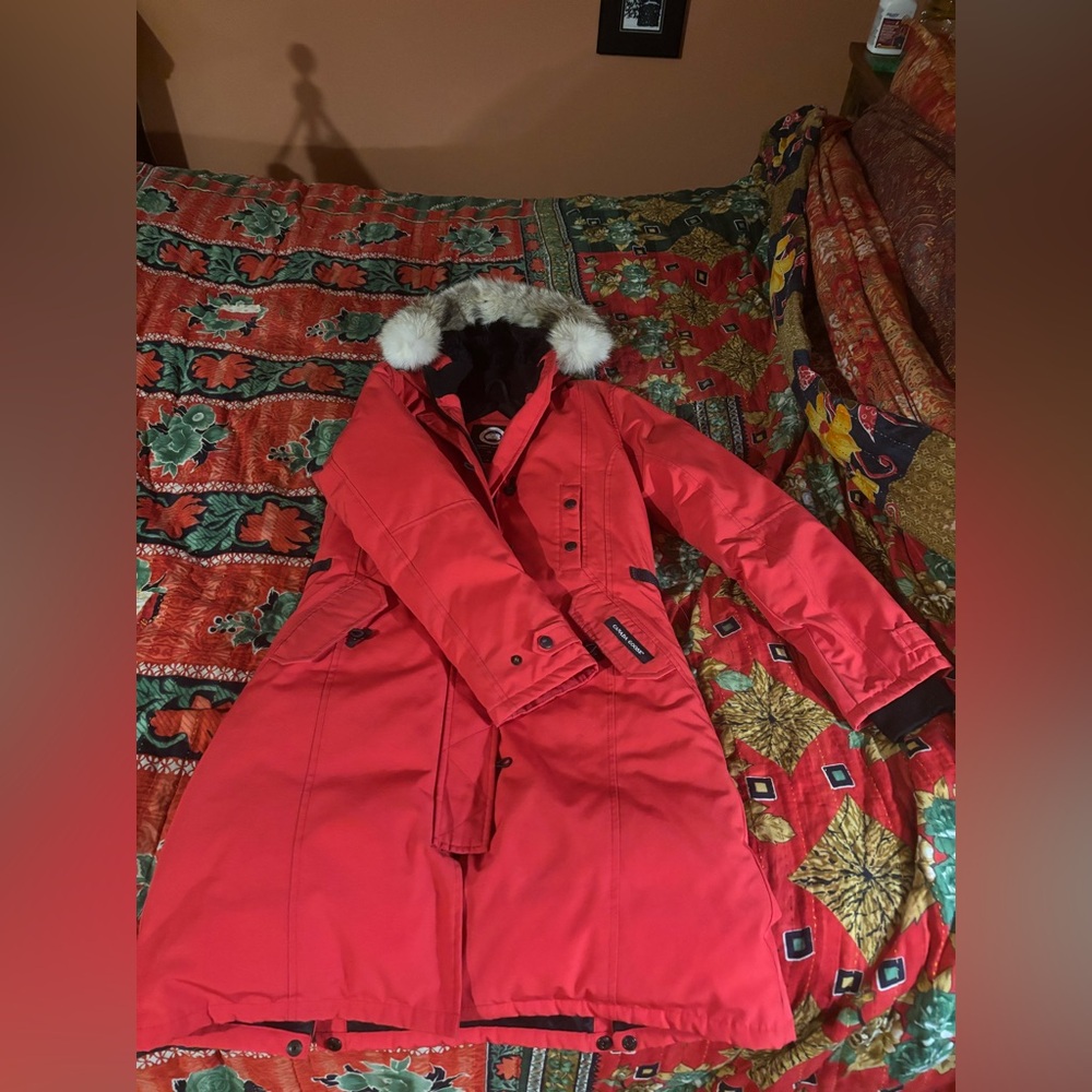 Get it before next winter - 
Canada Goose Women's Red Ski Jacket with Fur Hood